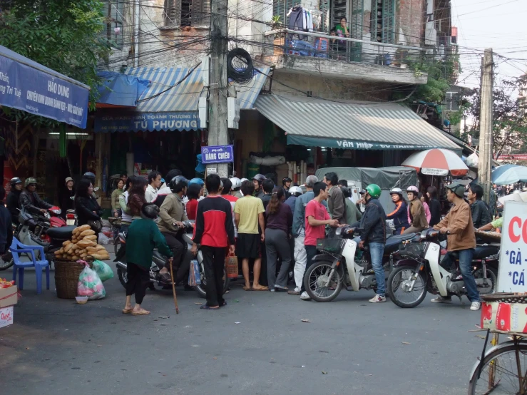 large group of people on a crowded city street