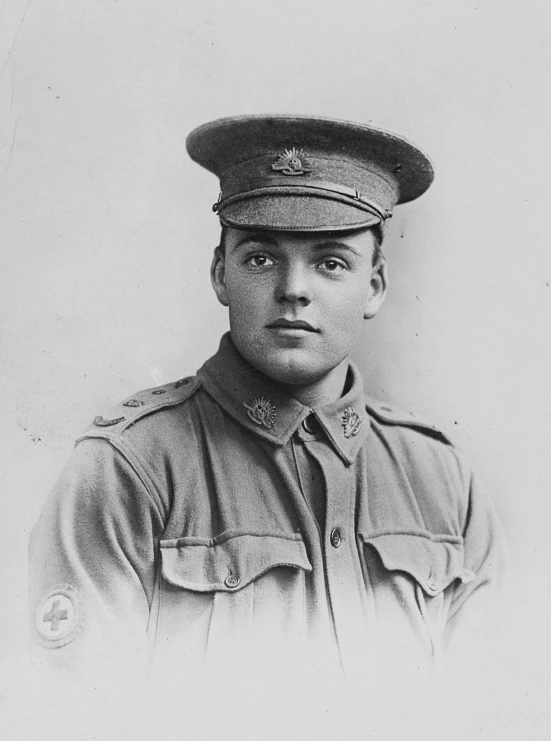 a black and white po of a man wearing a uniform