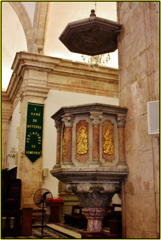 an intricate water fountain is on display in the cathedral