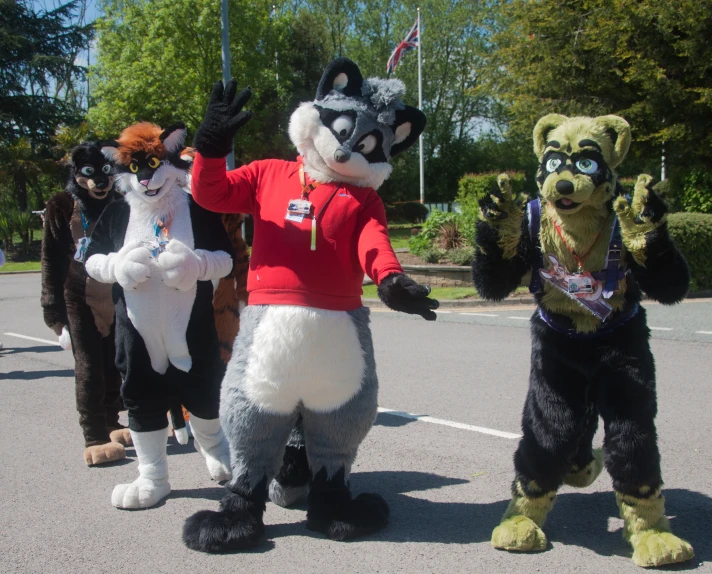 a group of people dressed in animal costumes