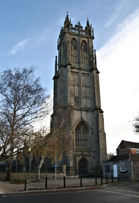 this tall brick church has arched windows