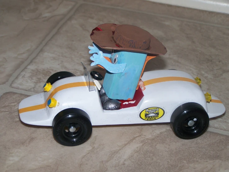a toy car with an object on the back