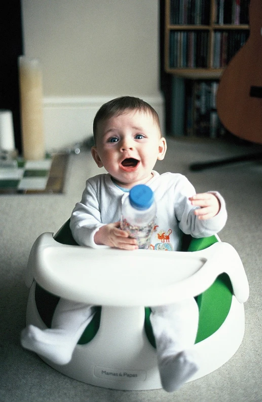 there is a little boy in a big chair