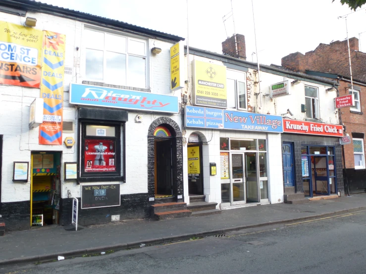 a building with several stores on the outside