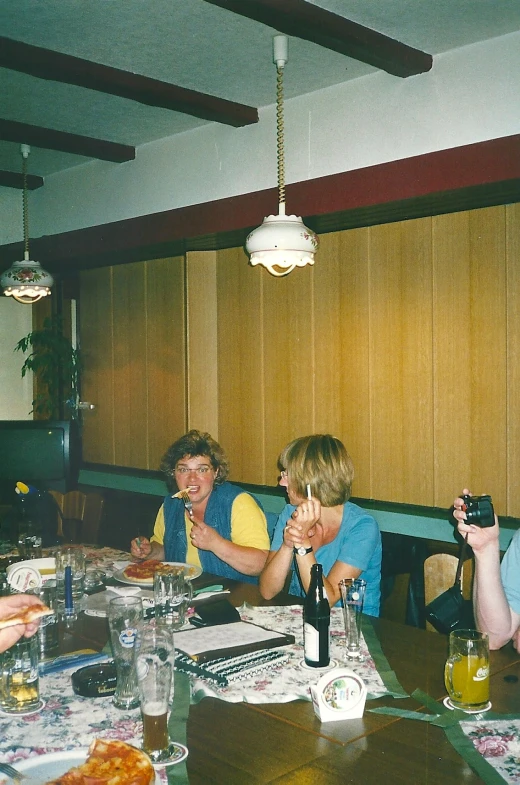 a group of people that are at a table