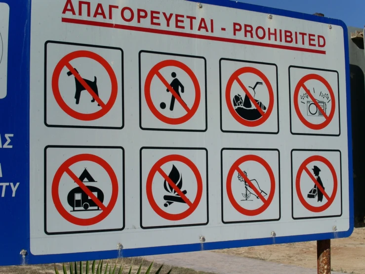 a sign with many different pictures and symbols on it