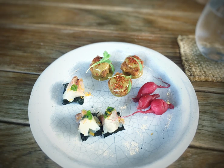 a white plate topped with three different types of food