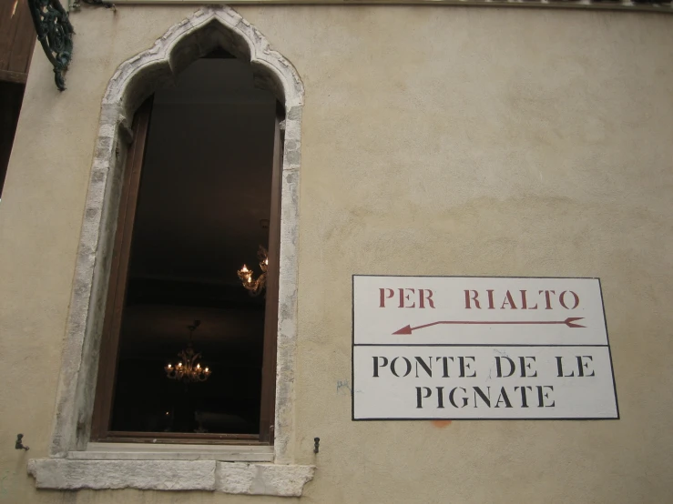 a sign on the wall stating where the people are