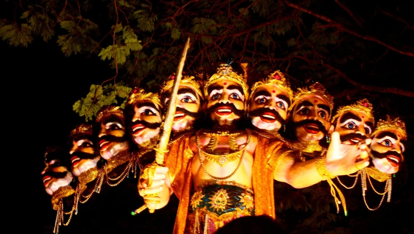 a group of people wearing face paint in an event