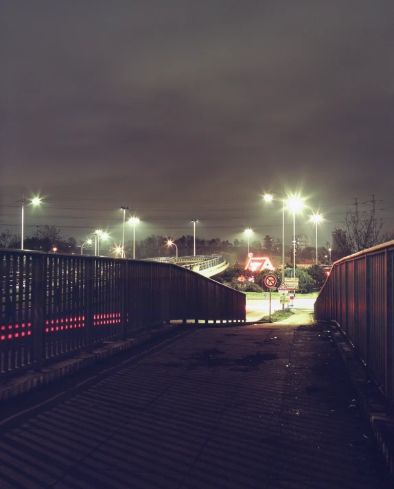 the long fenced path leads to the traffic