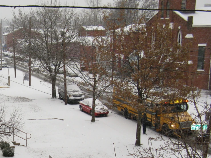 a large yellow bus on a city street