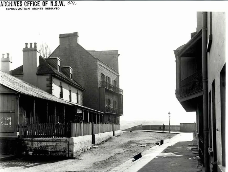 an old building near two other buildings