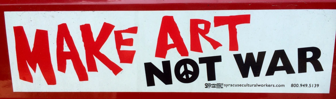 a sign that says make art not war on it