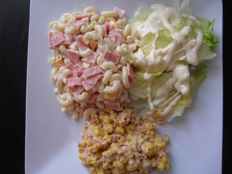 some salads that are on a white plate