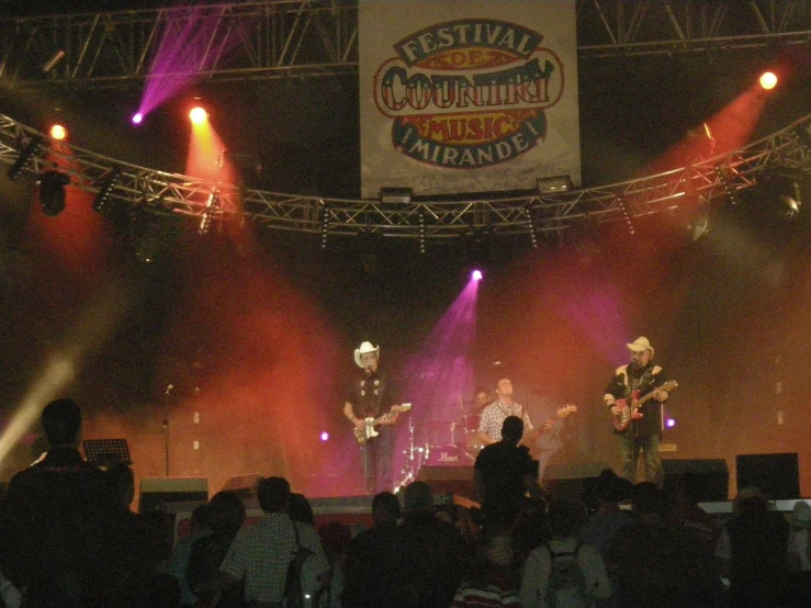 several people are in a group on stage