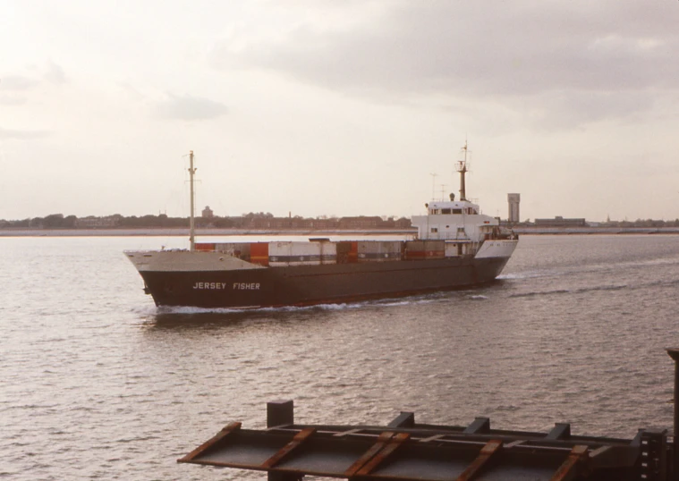 a large boat floating in the middle of water