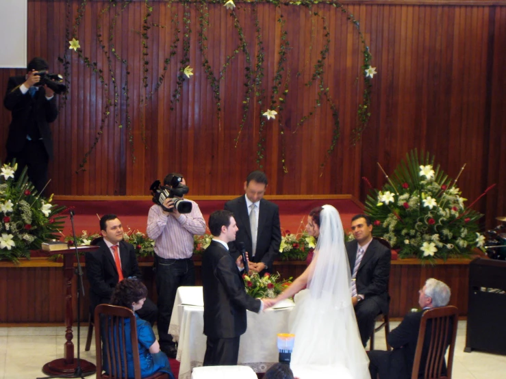 a man and woman getting married at their wedding