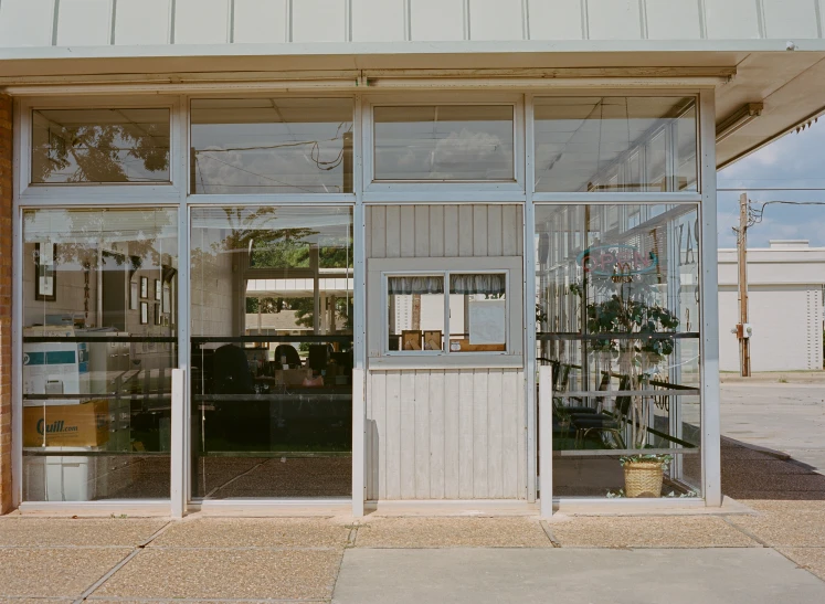 a storefront of a retail with several windows