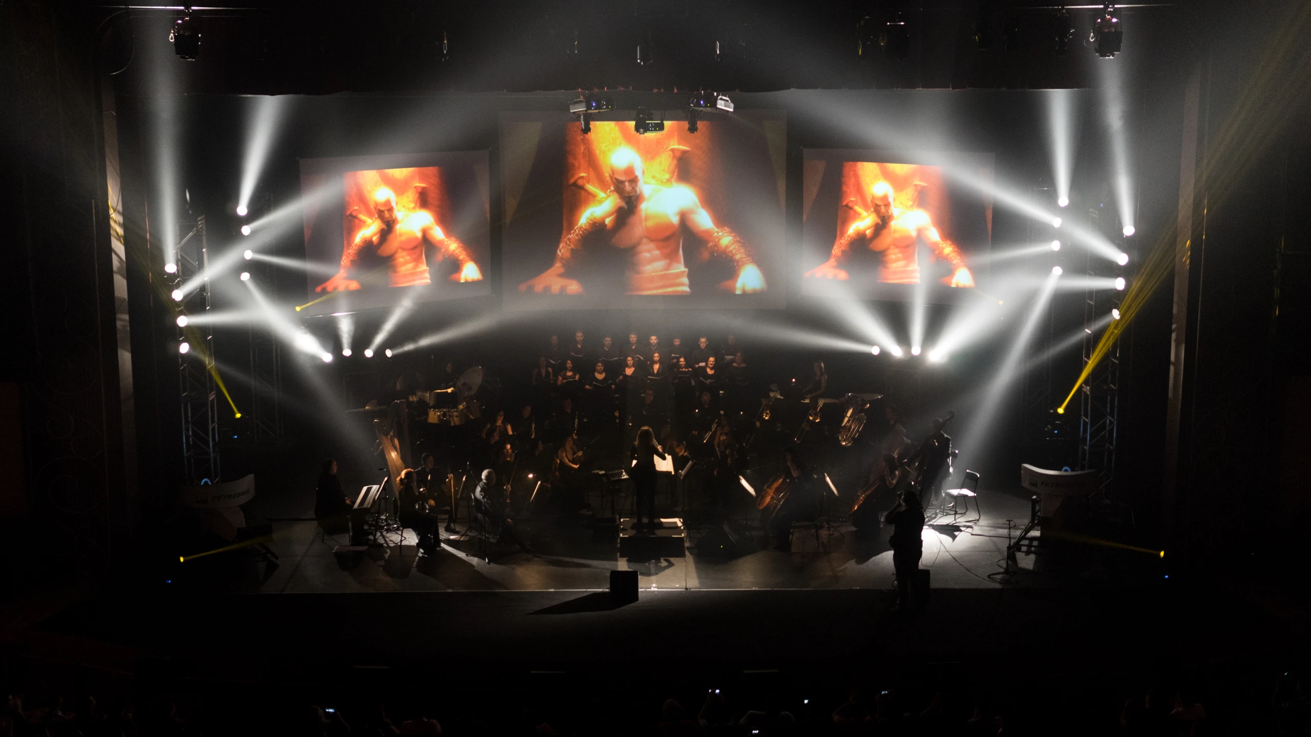 a show with big screens and light rays