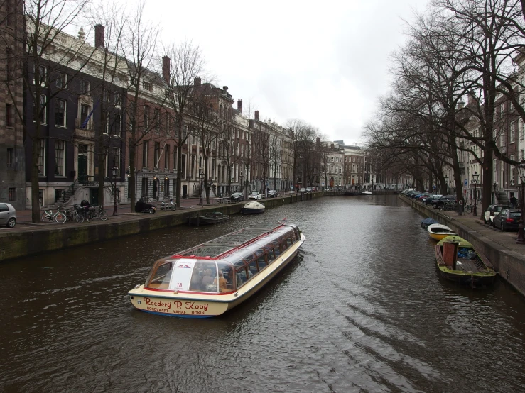 a river with some very small boats on it