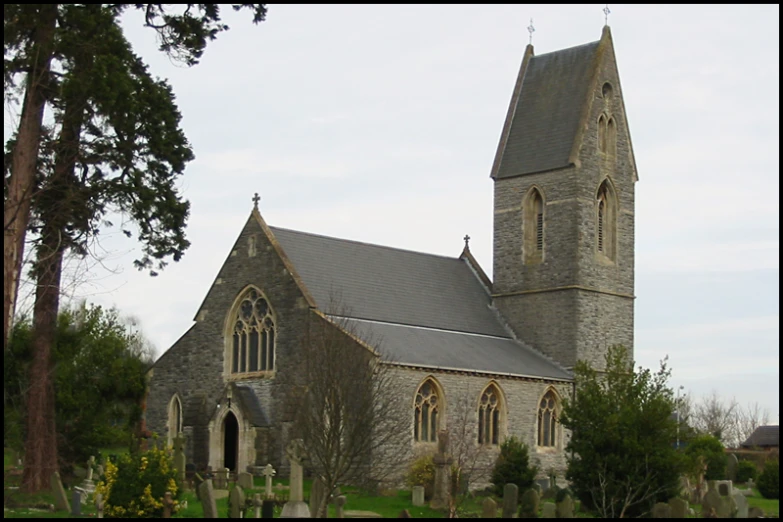 an old church stands alone near the grass