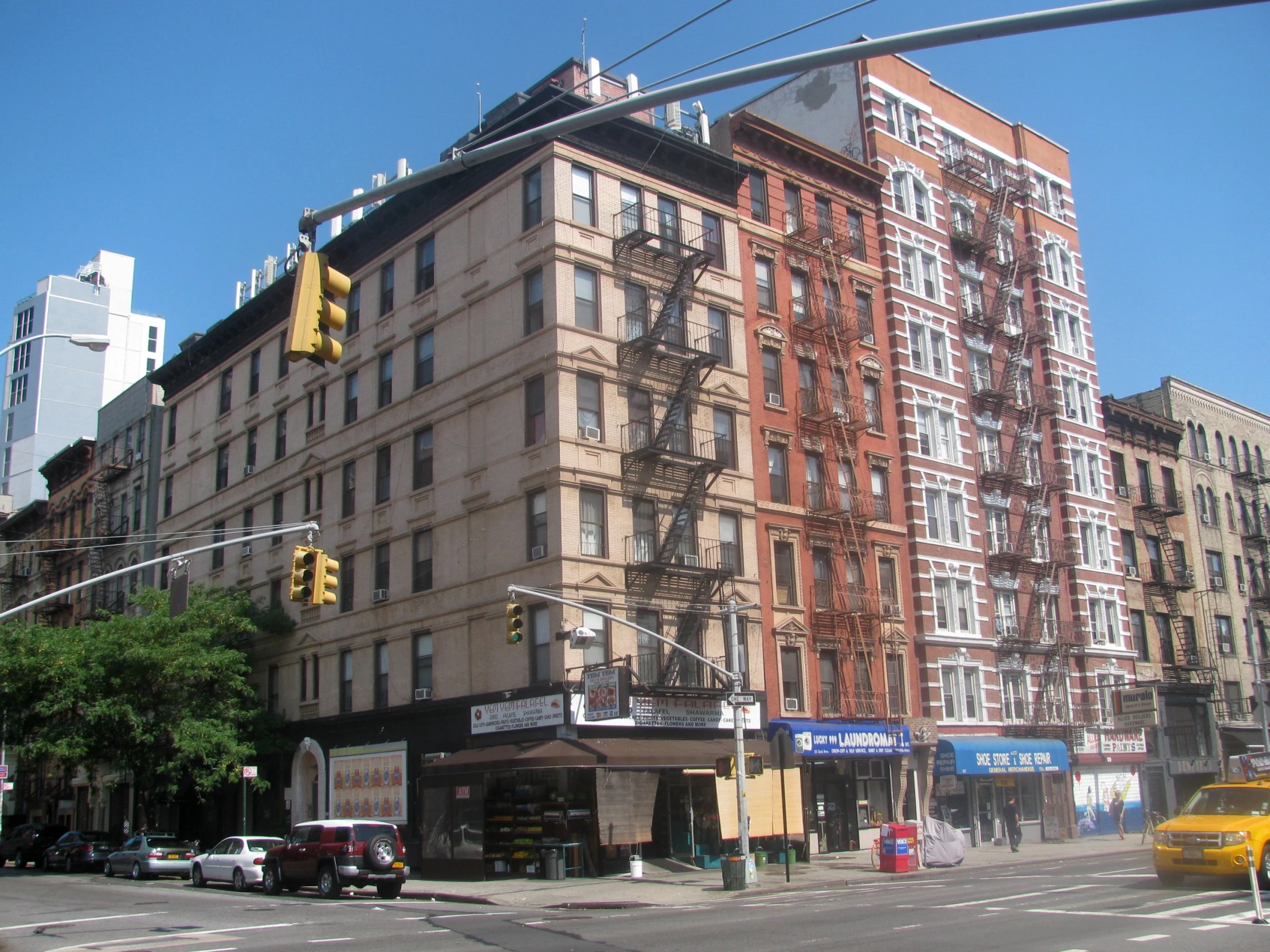 there is a building on a corner of the street