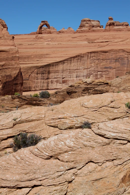 a man riding on a skateboard on a mountain