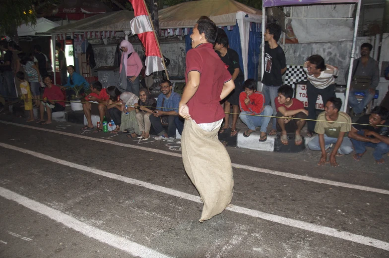 the man is doing a trick on a skateboard