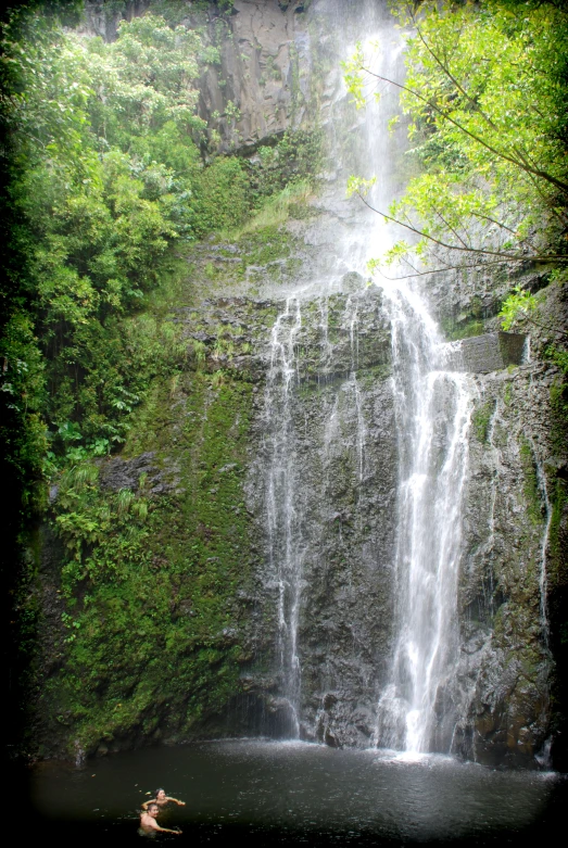 a waterfall that looks like it has water falling off the cliff