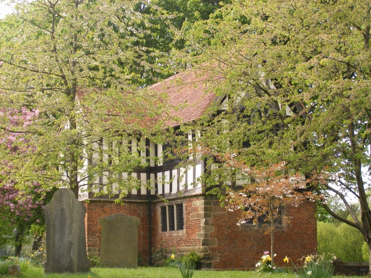 an old, dilapidated and abandoned church surrounded by trees