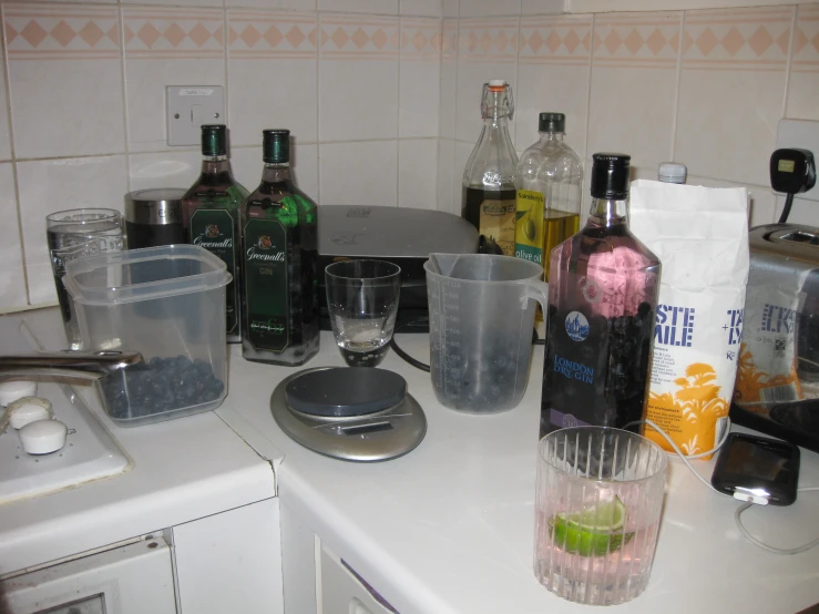 a counter that has various bottles on it