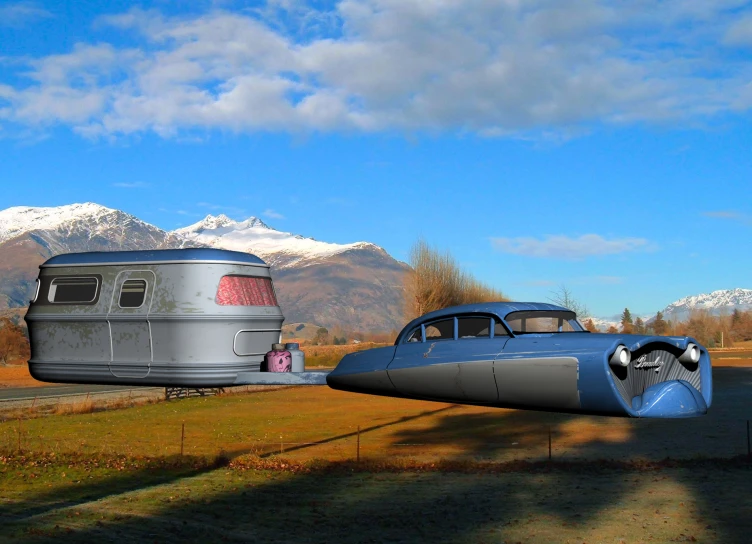 a car and airplane are parked beside a mountain