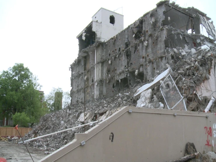 a pile of rubble is near the stairs