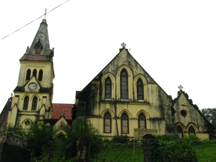 an old abandoned church with a clock tower