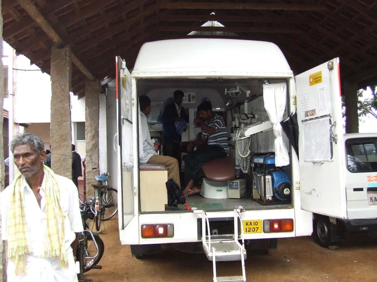 people with bikes and trucks are loading up and ready to move