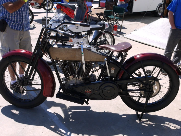 a motorcycle is being inspected in the open