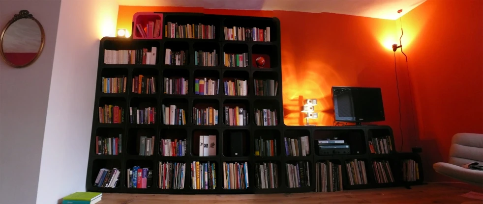 this is a bookshelf with a lot of books on it