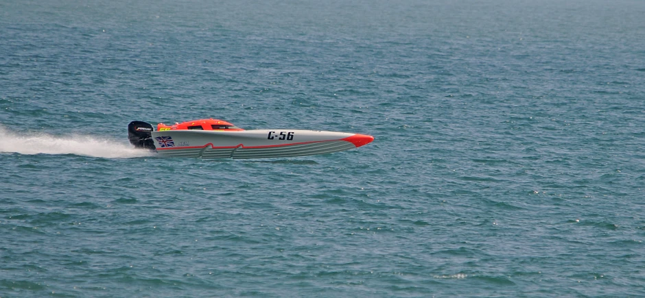 an airplane flying over a large body of water