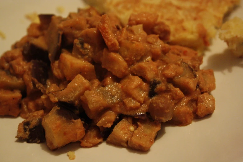 a plate of food with meat and vegetables on it