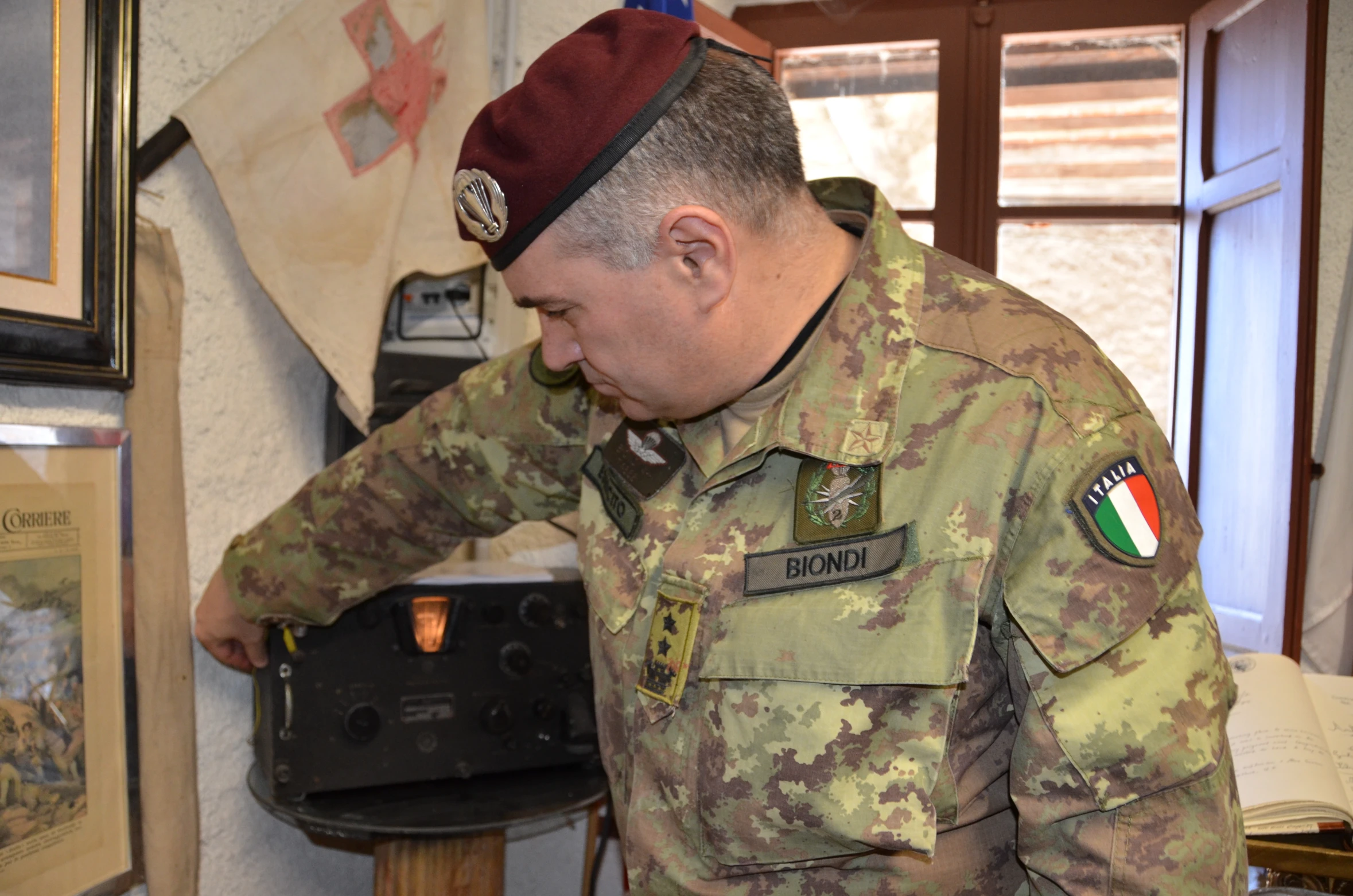 a soldier standing by the mailbox