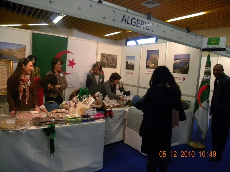 people in a building looking at a display of artifacts