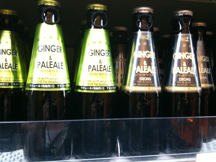 a shelf filled with bottles of alcohol sitting on top of a counter