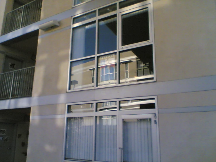 a very large, grey building with many windows