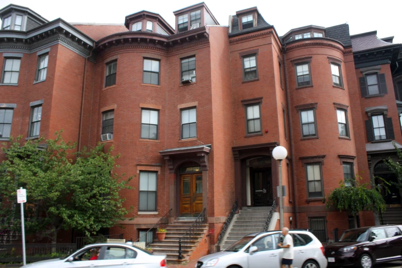 the front side of the brick buildings with multiple levels