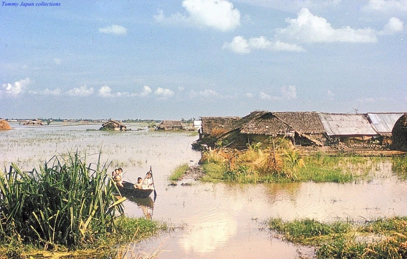 a village in the middle of a flooded river