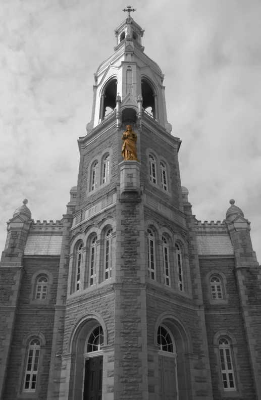 a clock tower with a bell on top