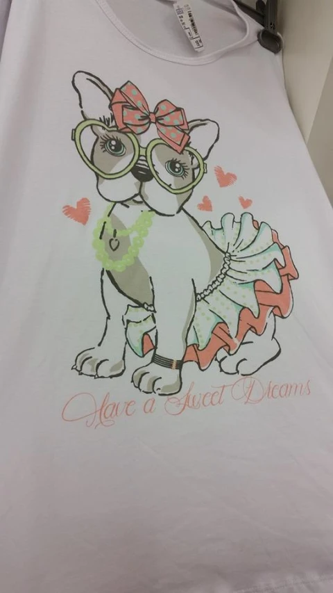 a dog wearing goggles is on a shirt