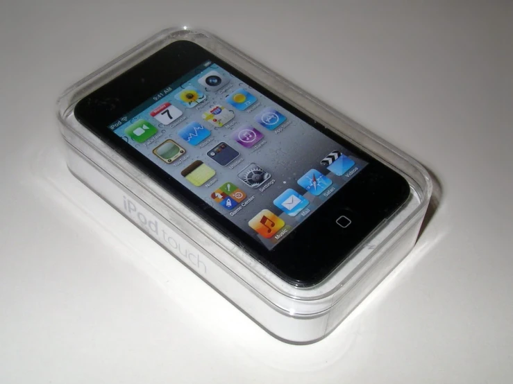 a white and black cell phone in a case