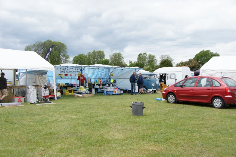 the group is at their tents set up with tents