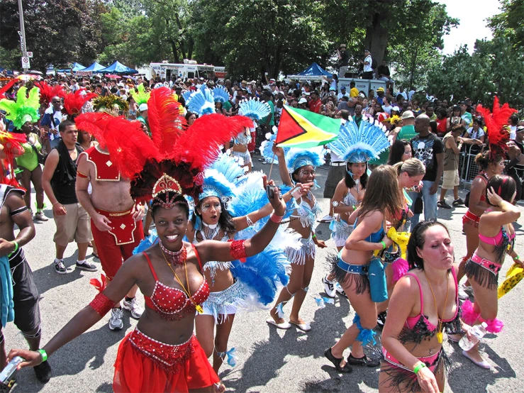 a group of people in colorful outfits at an event